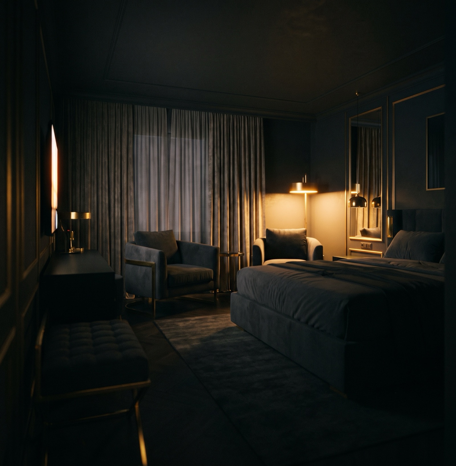 A dark room lit by the warm gold glow of a screen